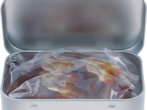 Large flat hinged tin with Haribo cola bottles